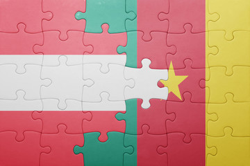 puzzle with the national flag of austria and cameroon