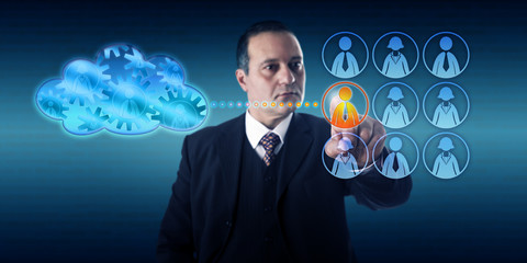 Businessman Moving A Work Process Into The Cloud