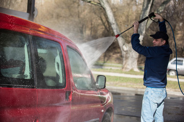 Men Washing His Car
