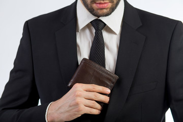 Businessman put his wallet back - 106055481