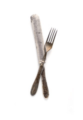 Vintage knife and fork on a white background