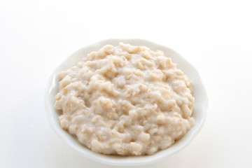 Oat in a bowl. Oatmeal day.