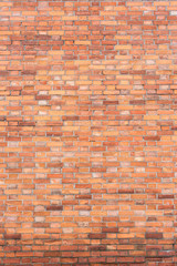 Fototapeta premium Кирпичная стена вертикально