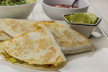 Mexican quesadillas with chicken, green beans and leek