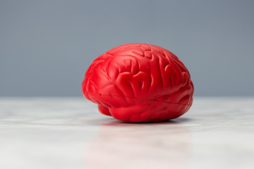 Red brain figurine