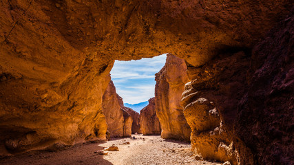 Sandstone Arch. Wind and water did the bridge between the rocks. Natural bridge canyon trail, Death Valley