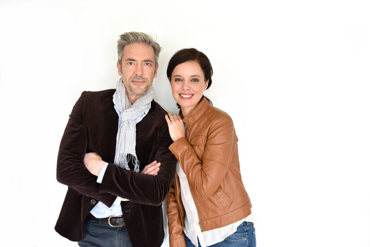 Middle-aged Couple Standing On White Background