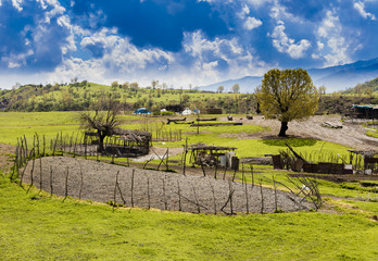 Iraqi countryside with circular fence inside near Duhok city