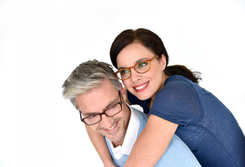 Middle-aged couple with eyeglasses on white background