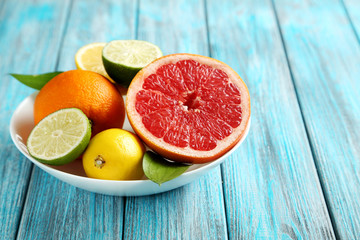 Citrus fruits on a blue wooden table