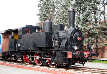 Fototapeta na wymiar Old black vintage steam locomotive