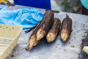 Grilled sweet corn on the charcoal stove.sensitive focus