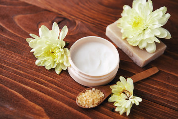 Obraz na płótnie Canvas Spa setting with natural handmade soap, sea salt beauty cream