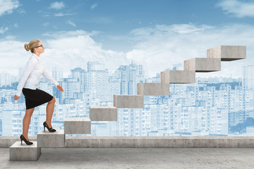 Business person stepping up a staircase. business concept
