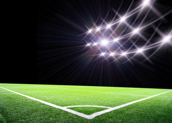 Fototapeta na wymiar lights at night and big soccer stadium