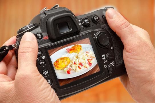 Photo of isolated food on camera display during session. Making stock photography.