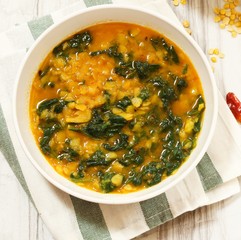 Dal Indian lentil curry soup with spinach