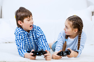 Kids playing game console