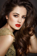 Fototapeta premium Beauty makeup woman red lips long brown hair