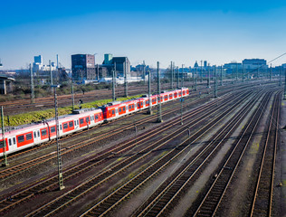 Fototapeta na wymiar passenger train. Red train on tracks
