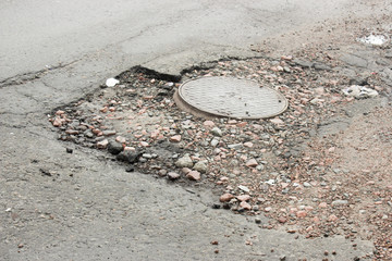 pothole in the asphalt
