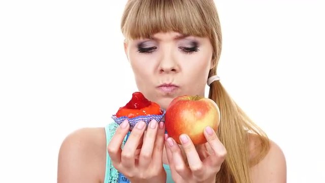 Woman choosing fruit or cake make dietary choice 4K