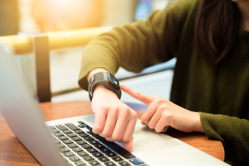 Woman connecting with laptop computer