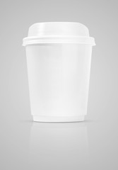 blank coffee cup to go isolated on gray background