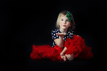 The girl sends an air kiss