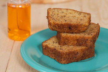 Homemade banana bread sliced on a table . rustic style