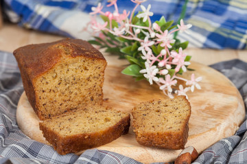 Homemade banana bread sliced on a table . rustic style