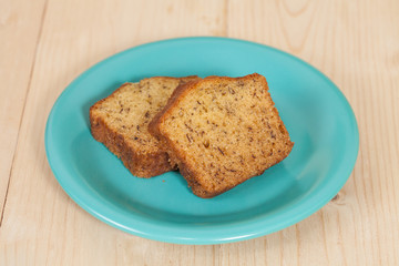 Homemade banana bread sliced on a table . rustic style