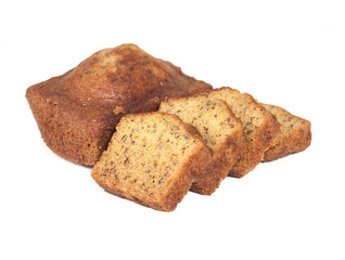 Homemade banana bread sliced on white background