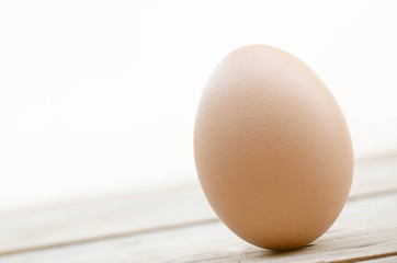 Close up egg on the wood and white background with clipping path 