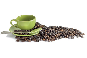 coffee beans and green cup isolated on a white background
