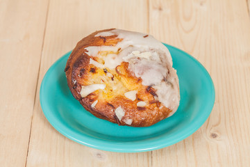 coconut bread in a plate on wood table