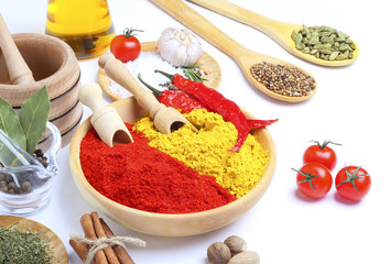 Spice in Wooden Spoon isolated white background
