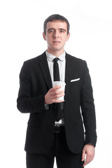 Man in suit with the coffee cup