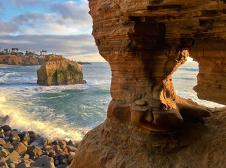 Natural rock formations along beach coastline, Sunset Cliffs, California, USA