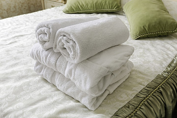 Towel in Hotel bedoom. Welcome guests room service