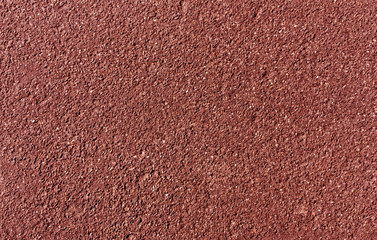 Red painted asphalt background and texture.