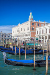 Fototapeta na wymiar traditional Gondolas on Grand Canal in Venice, Italy
