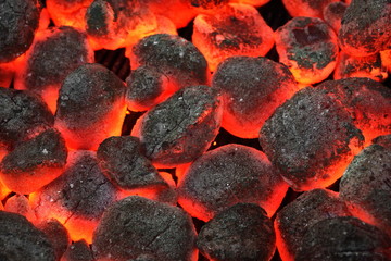 Barbecue Grill Pit With Glowing And Flaming Hot Charcoal Briquet