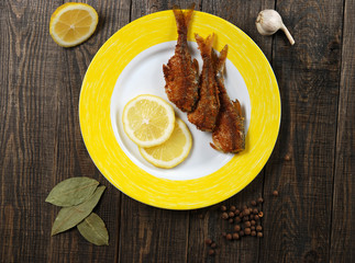 fried fish with lemon