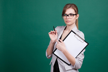 girl teacher with a folder and pen