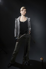 Fototapeta na wymiar young woman with a crossbow