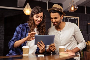 Couple using a tablet 