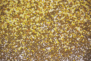 Close up a fine shining gold glitter