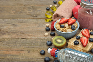 Items for sports on a wooden background