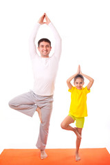 dad practicing yoga with daughter isolated - 106098425